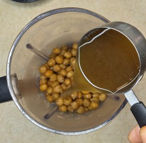 Puree garbanzo beans and aquafaba