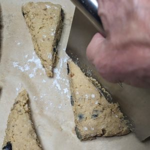 cutting berry scone
